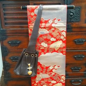 Vintage Vicenza brown epi-type leather, cross-body drawstring bucket bag